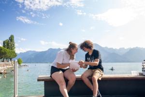 students in front of lake in montreux